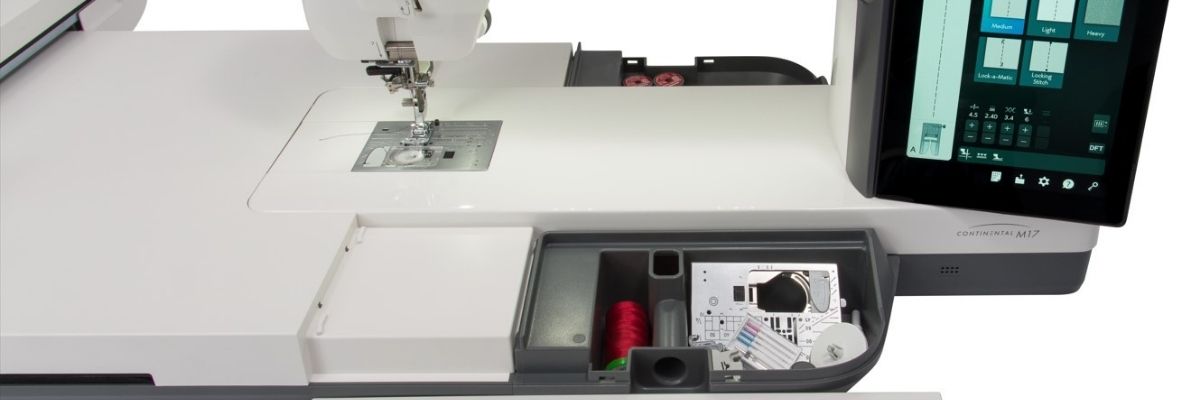 storage comp in emb tray - Janome Continental M17 Professional