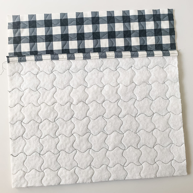 layer pillow back piece onto pillow front